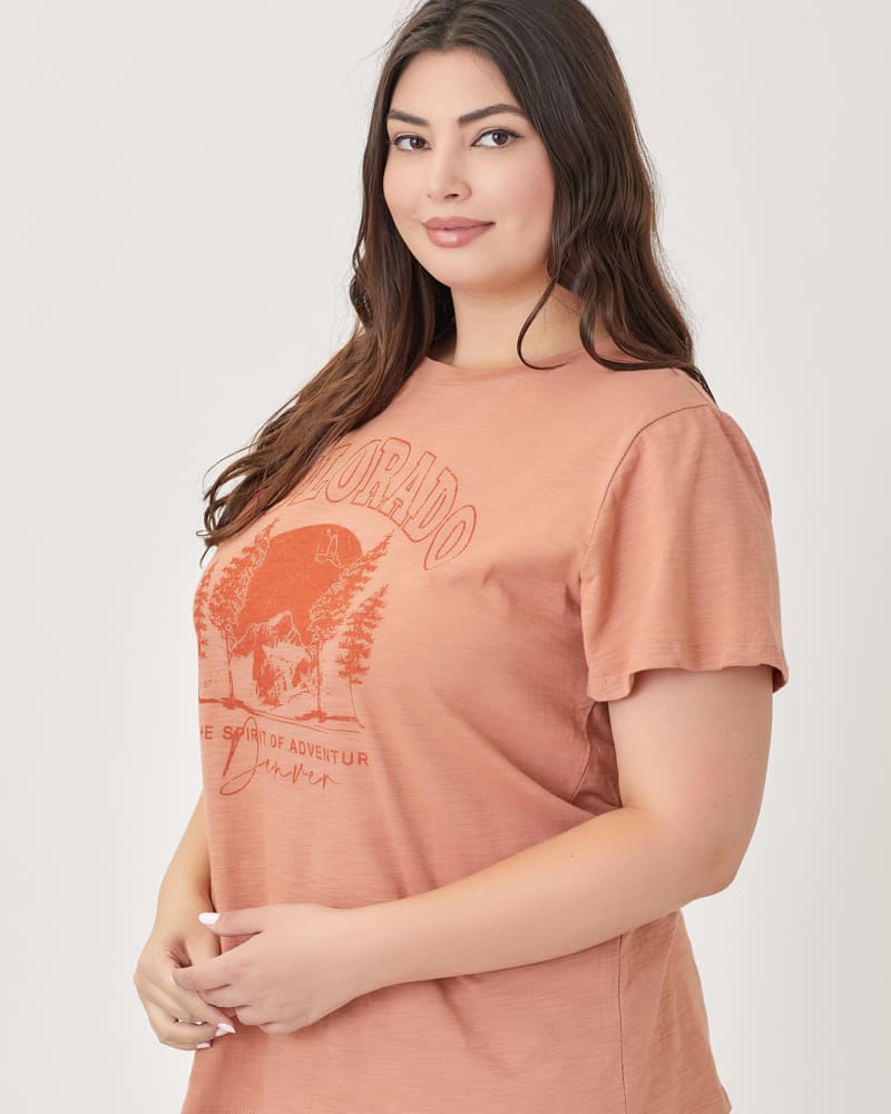 Side of a model wearing a size 3X Colorado Graphic Tee in TERRACOTTA by Polagram. | dia_product_style_image_id:274748